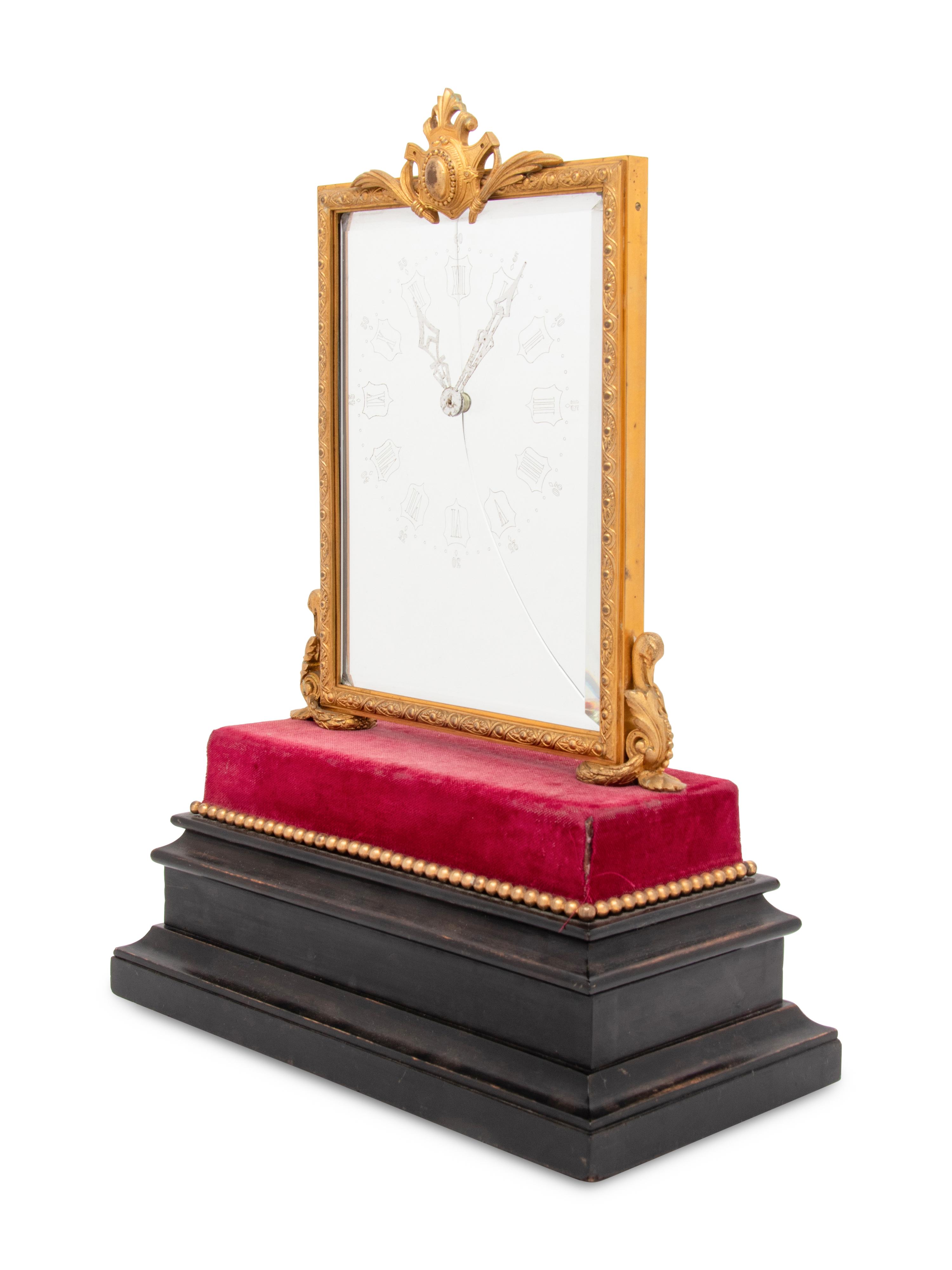 A French Gilt-Bronze Mounted Mystery Clock
