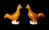 A Pair of Chinese Amber Glazed Pottery Figures of Standing Cockerels