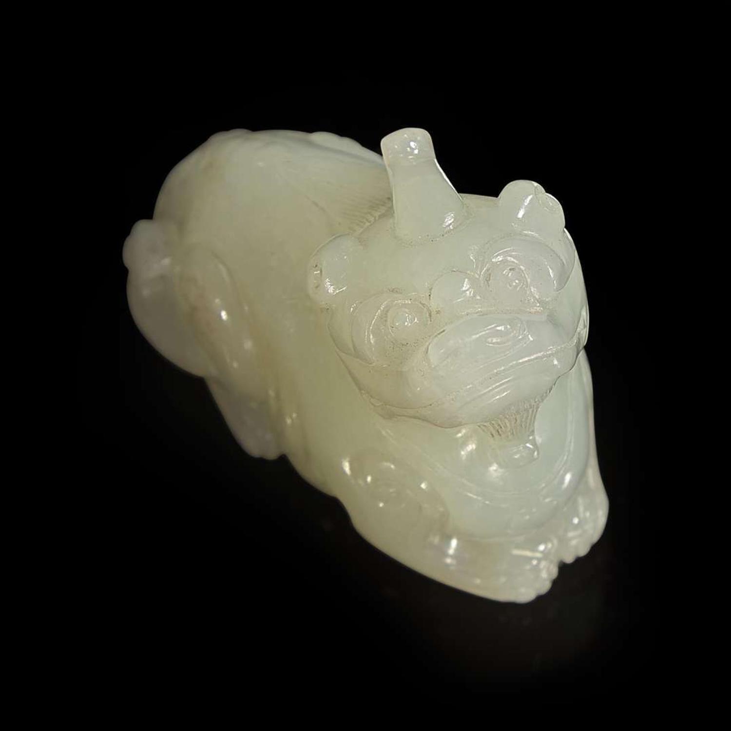 A Chinese carved white jade mythical beast 白玉雕瑞兽 Qing dynasty ?