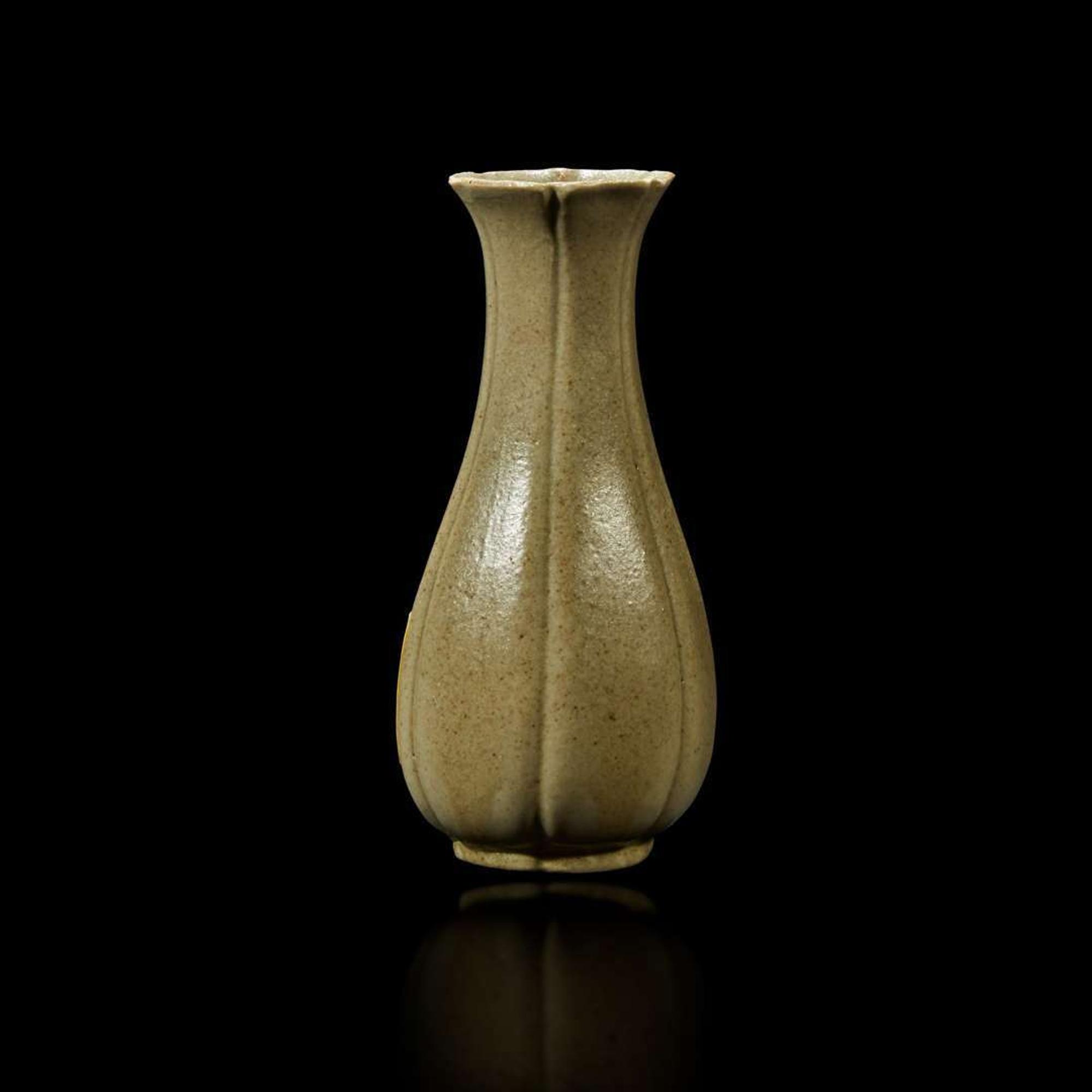 A Chinese grey-green-glazed lobed miniature vase Qing Dynasty, possibly 18th Century