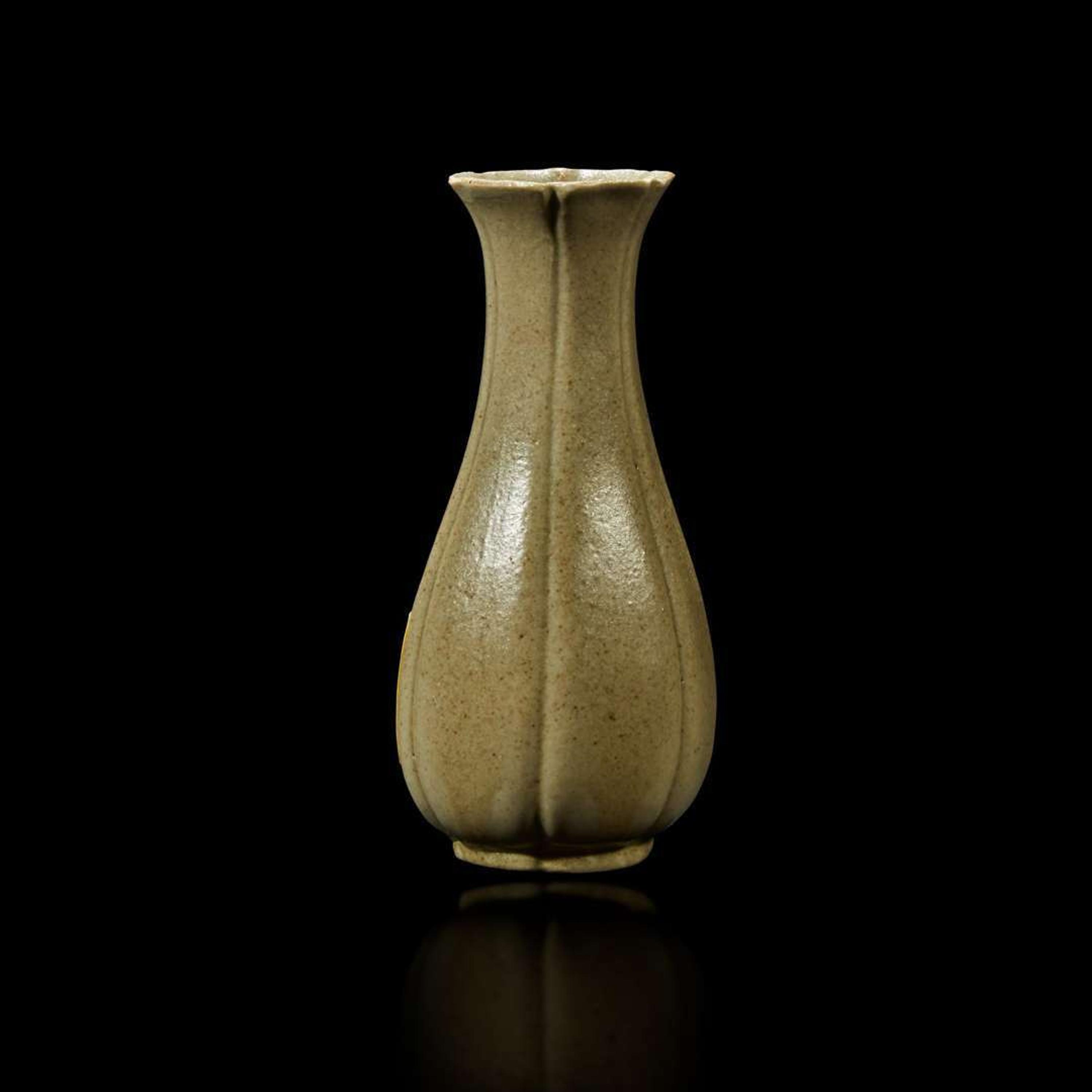 A Chinese grey-green-glazed lobed miniature vase Qing Dynasty, possibly 18th Century