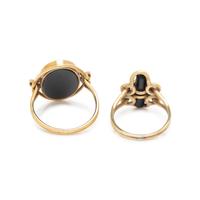 COLLECTION OF YELLOW GOLD AND BLACK ONYX RINGS