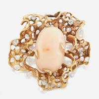 A gold, coral, and diamond pendant brooch