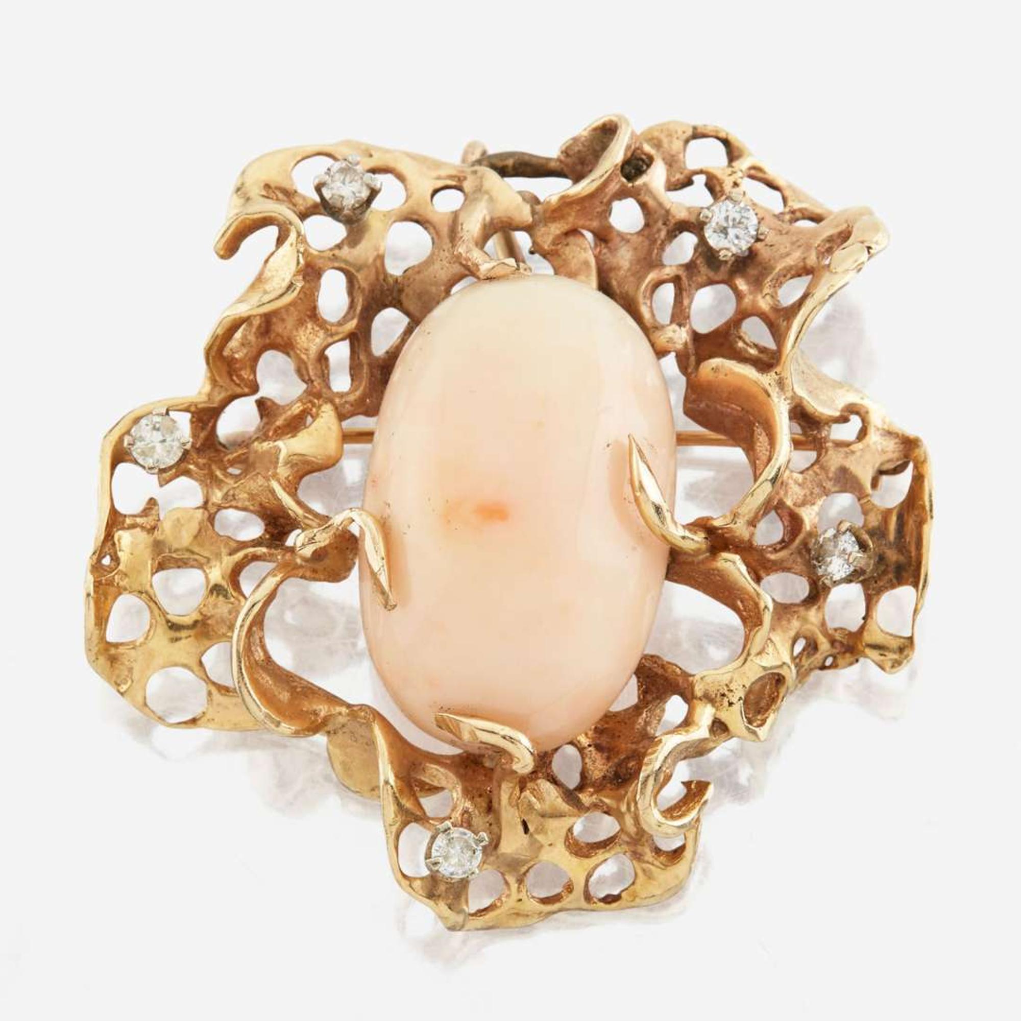 A gold, coral, and diamond pendant brooch