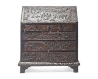 An English Relief-Carved Oak Slant-Front Desk