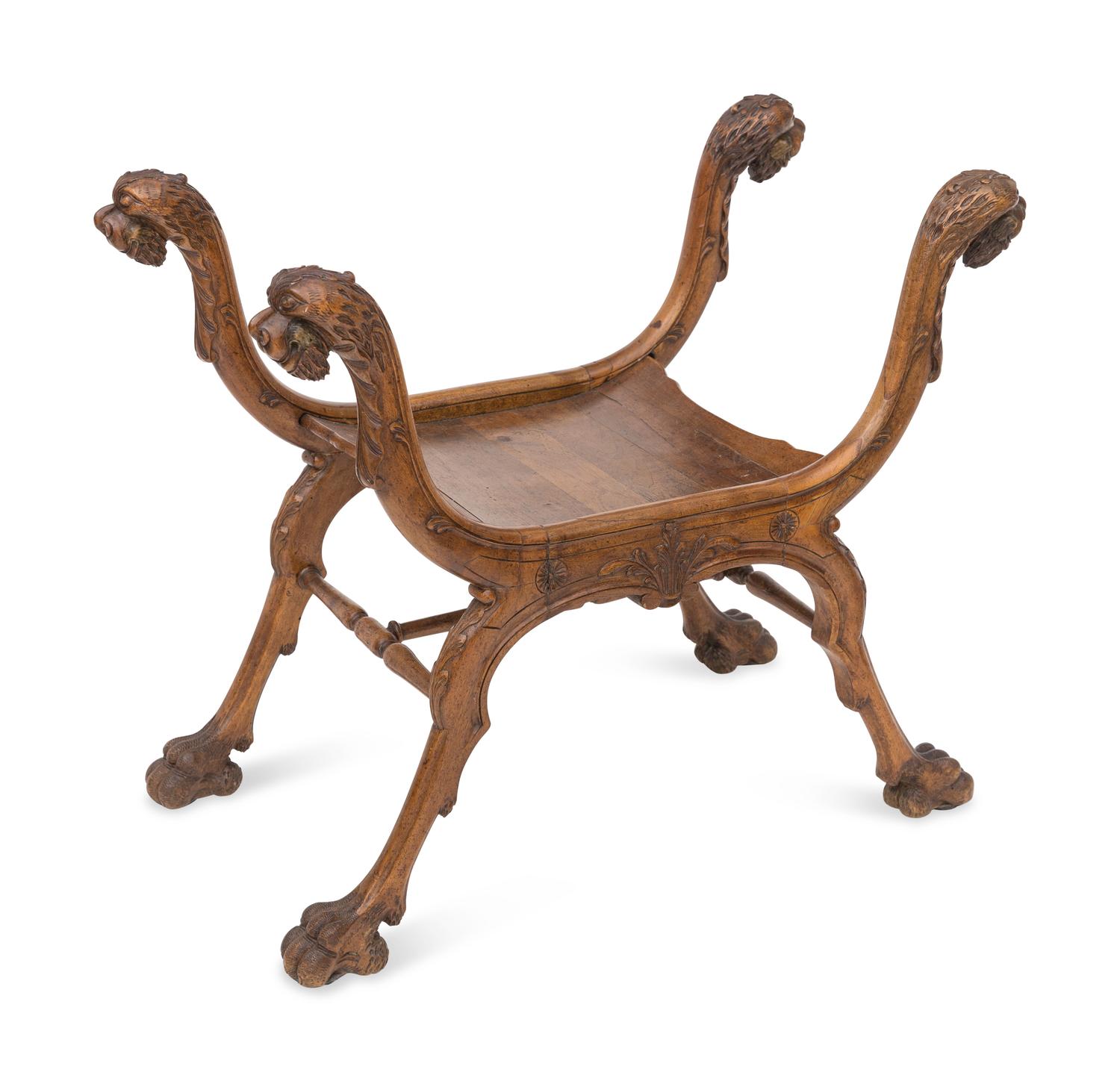 A Renaissance Revival Carved Walnut Curule Bench