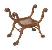 A Renaissance Revival Carved Walnut Curule Bench