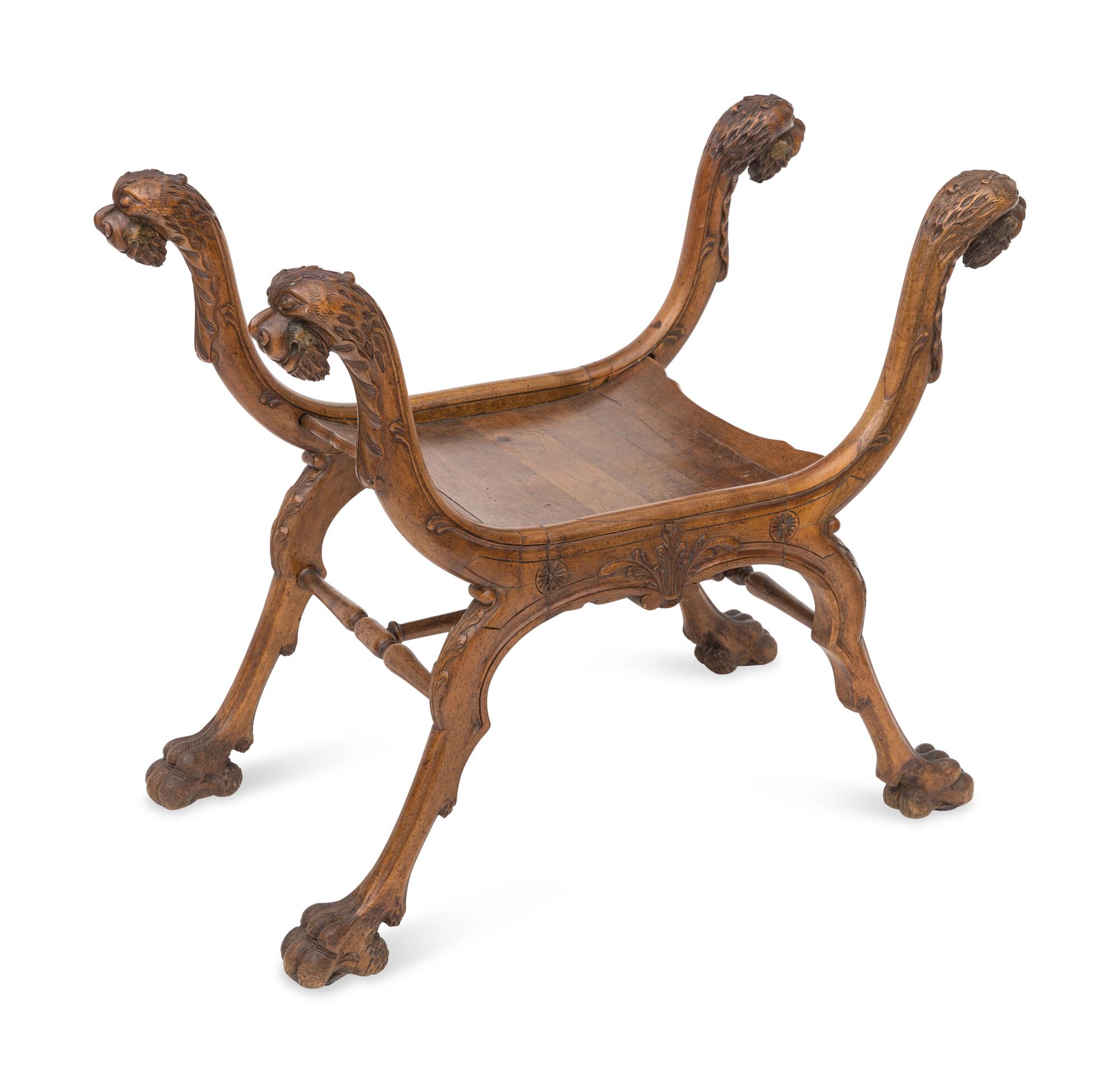 A Renaissance Revival Carved Walnut Curule Bench