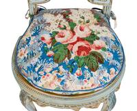 A Pair of Louis XVI Style Painted and Parcel-Gilt Chaises