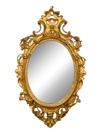 A Louis XV Style Giltwood Oval Mirror — LATE 18TH/EARLY 19TH CENTURY