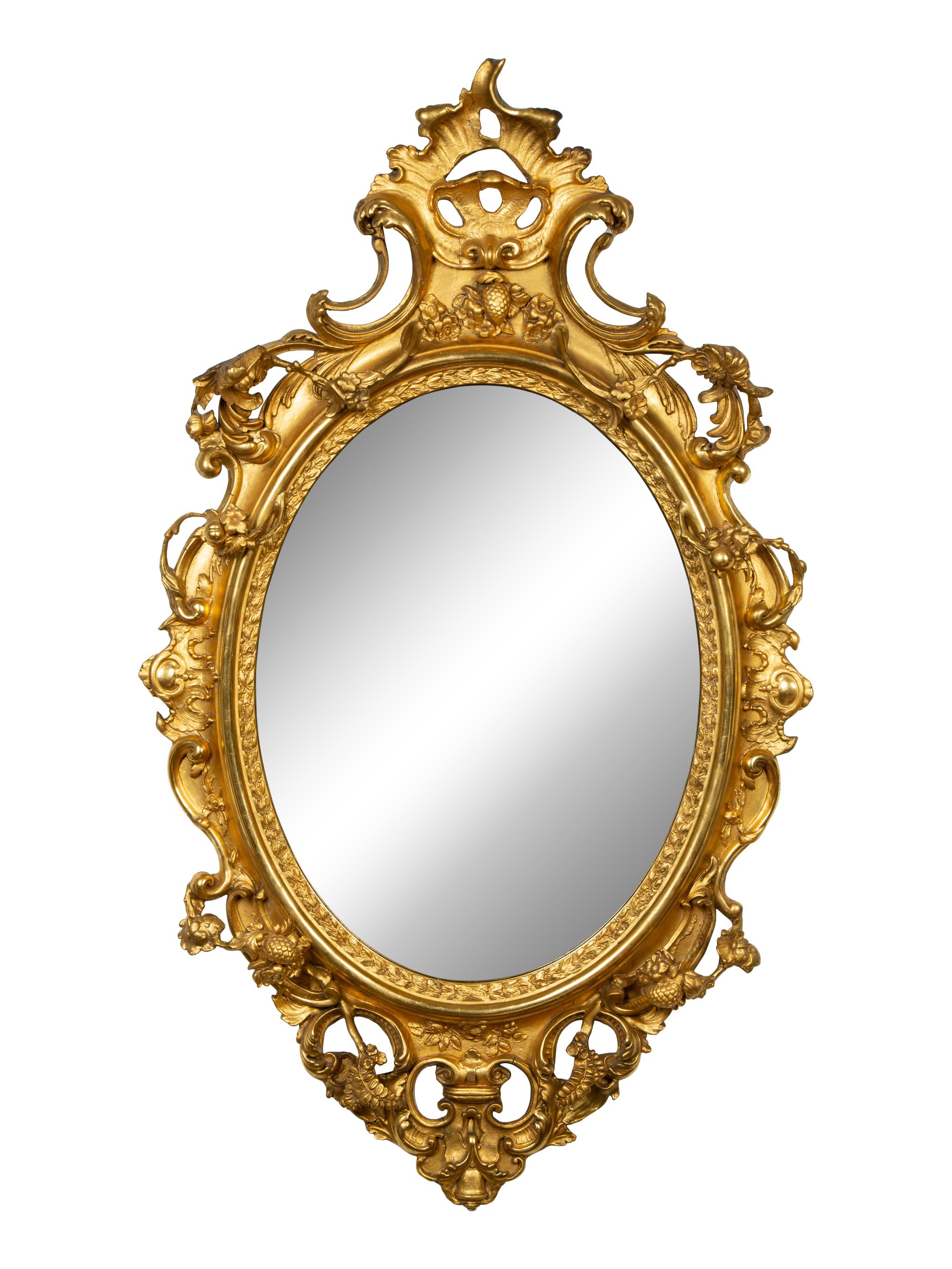 A Louis XV Style Giltwood Oval Mirror — LATE 18TH/EARLY 19TH CENTURY