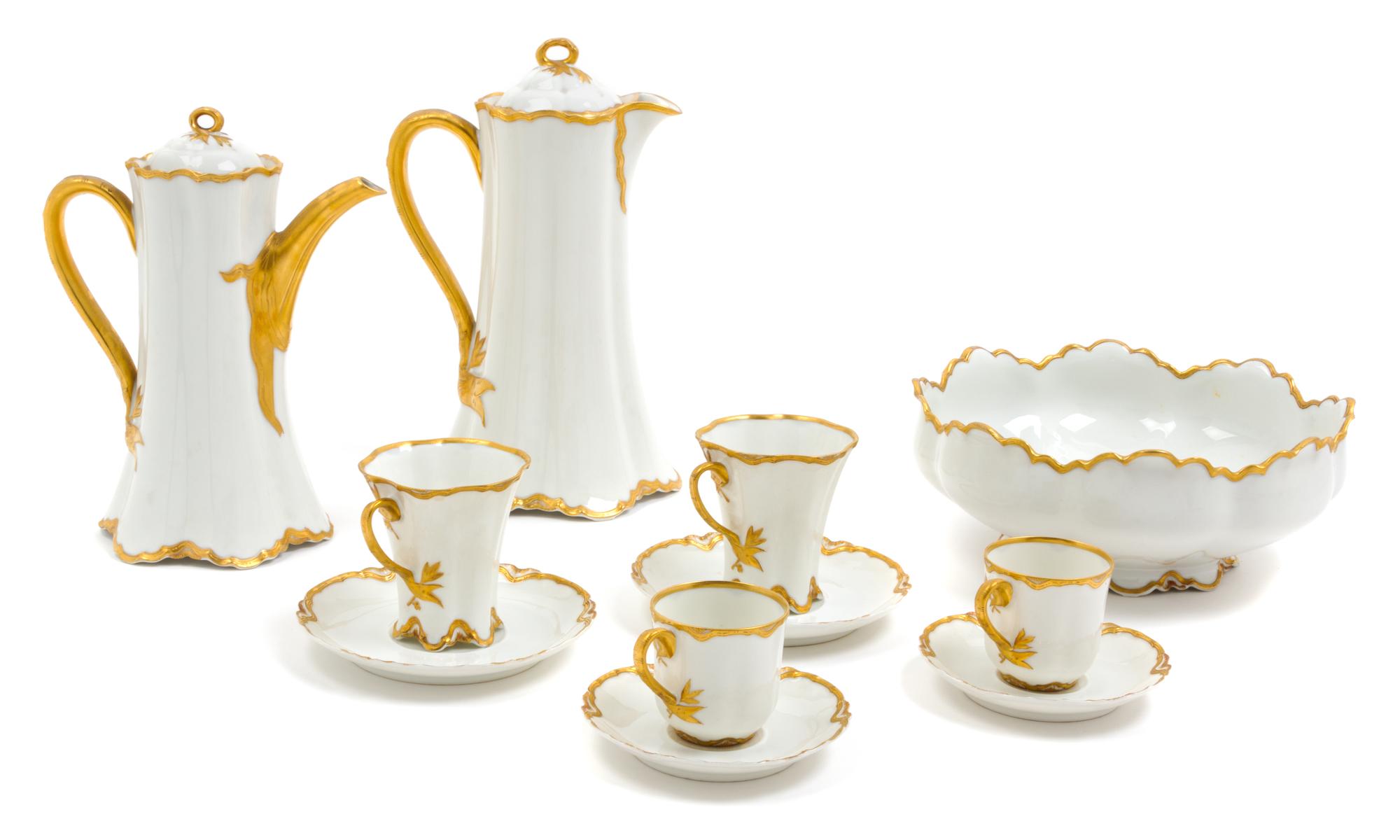 A Haviland Limoges Porcelain Coffee and Chocolate Service Height of tallest 10 1/4 inches.
