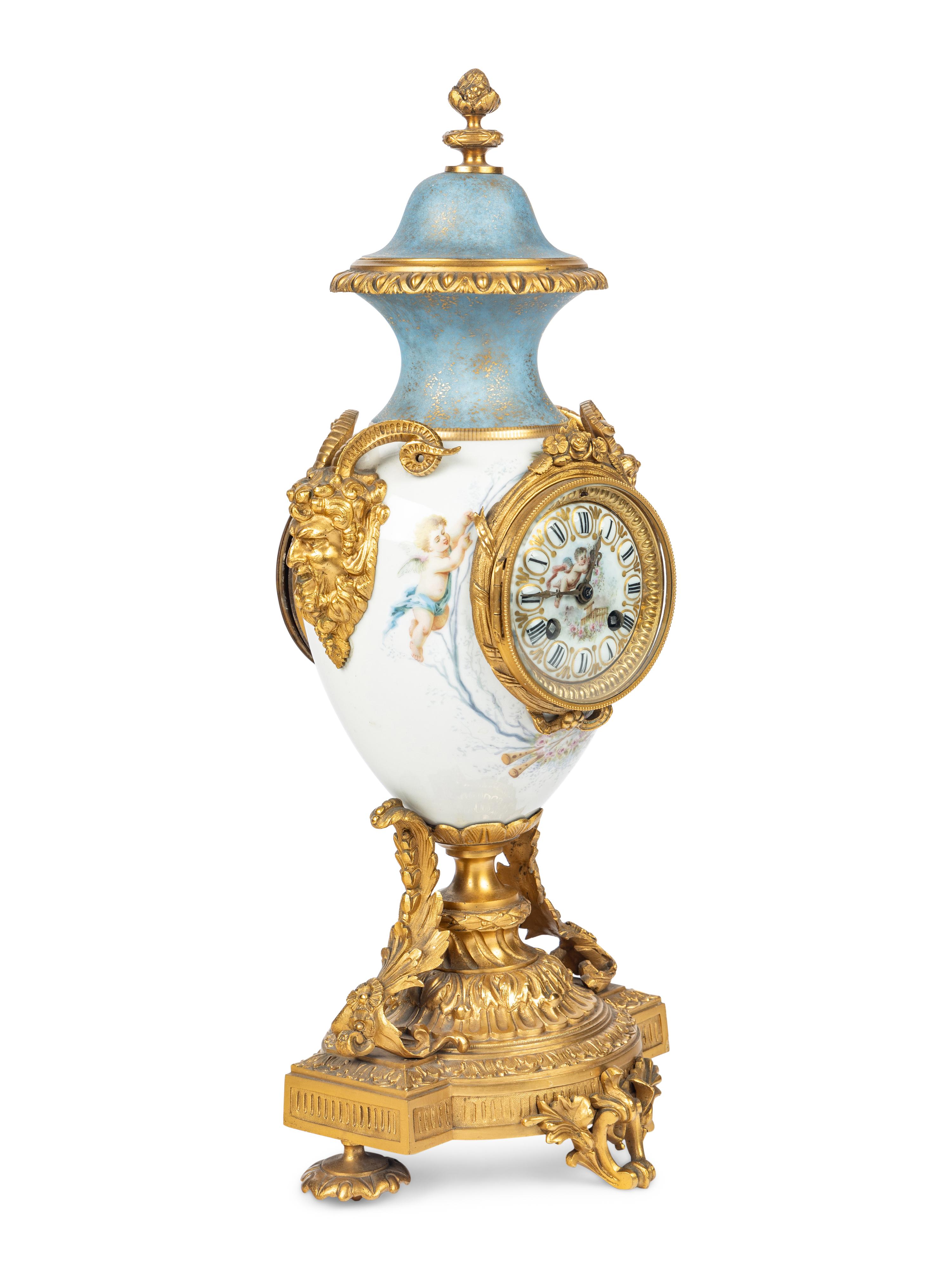 A French Gilt Bronze and Porcelain Urn-Form Clock