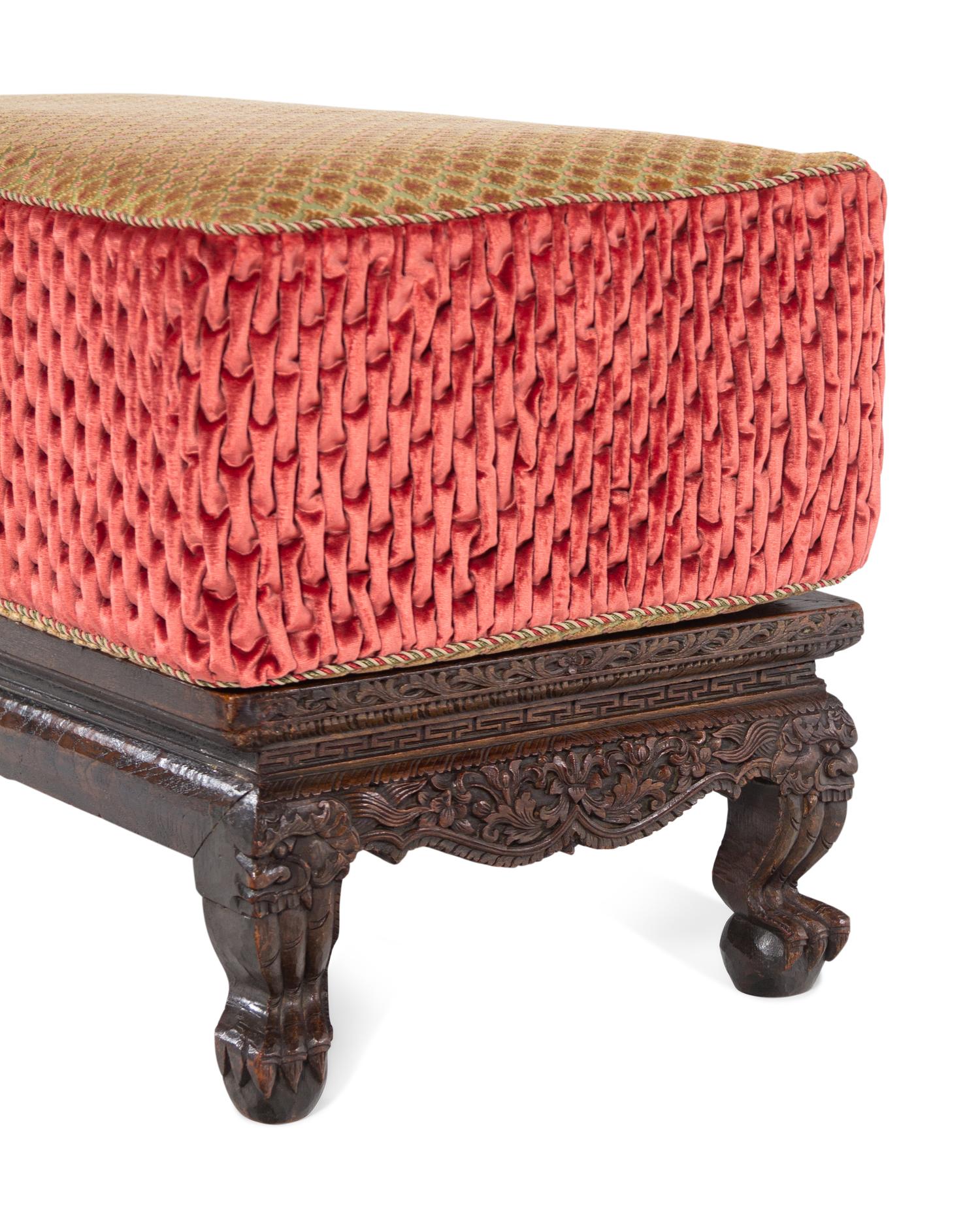 An Indian Carved Hardwood Low Stand Converted to an Upholstered Bench