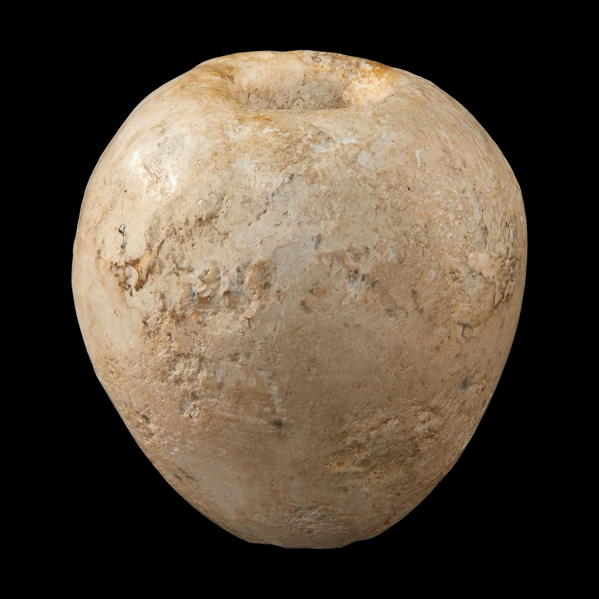 An Egyptian Limestone Mace Head