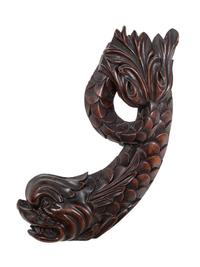 A Pair of Carved Mahogany Dolphin Brackets