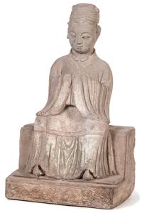 A Carved Stone Buddha Sitting on a Tiered Base