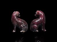 A pair of Chinese export aubergine-glazed porcelain seated dogs, 茄紫釉小狗一對