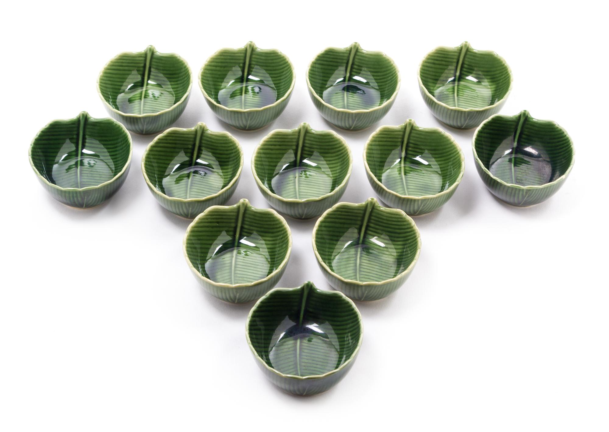 Twenty Porcelain Leaf-Form Bowls Length of largest 5 1/2 inches. — 20TH CENTURY