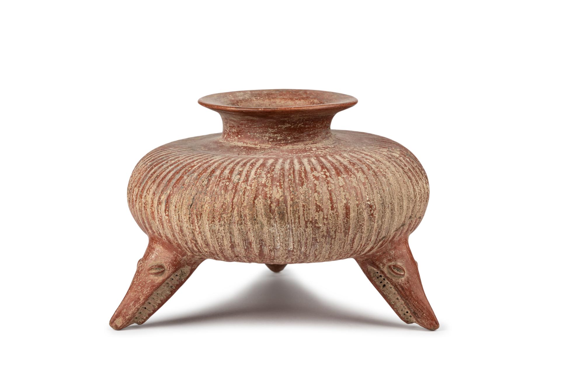 A Colima Gadrooned Vessel with Shark Feet