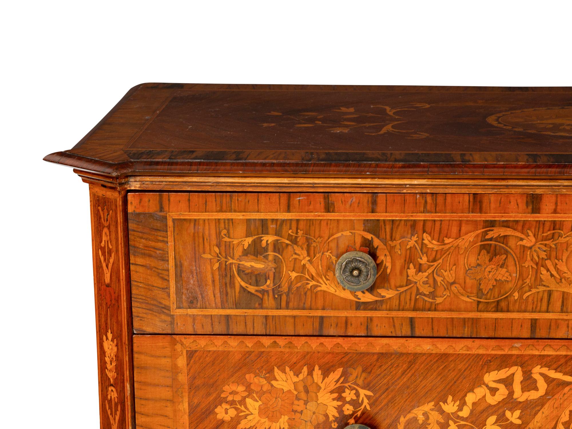 An Italian Neoclassical Walnut and Marquetry Commode in the Manner of Maggiolini
