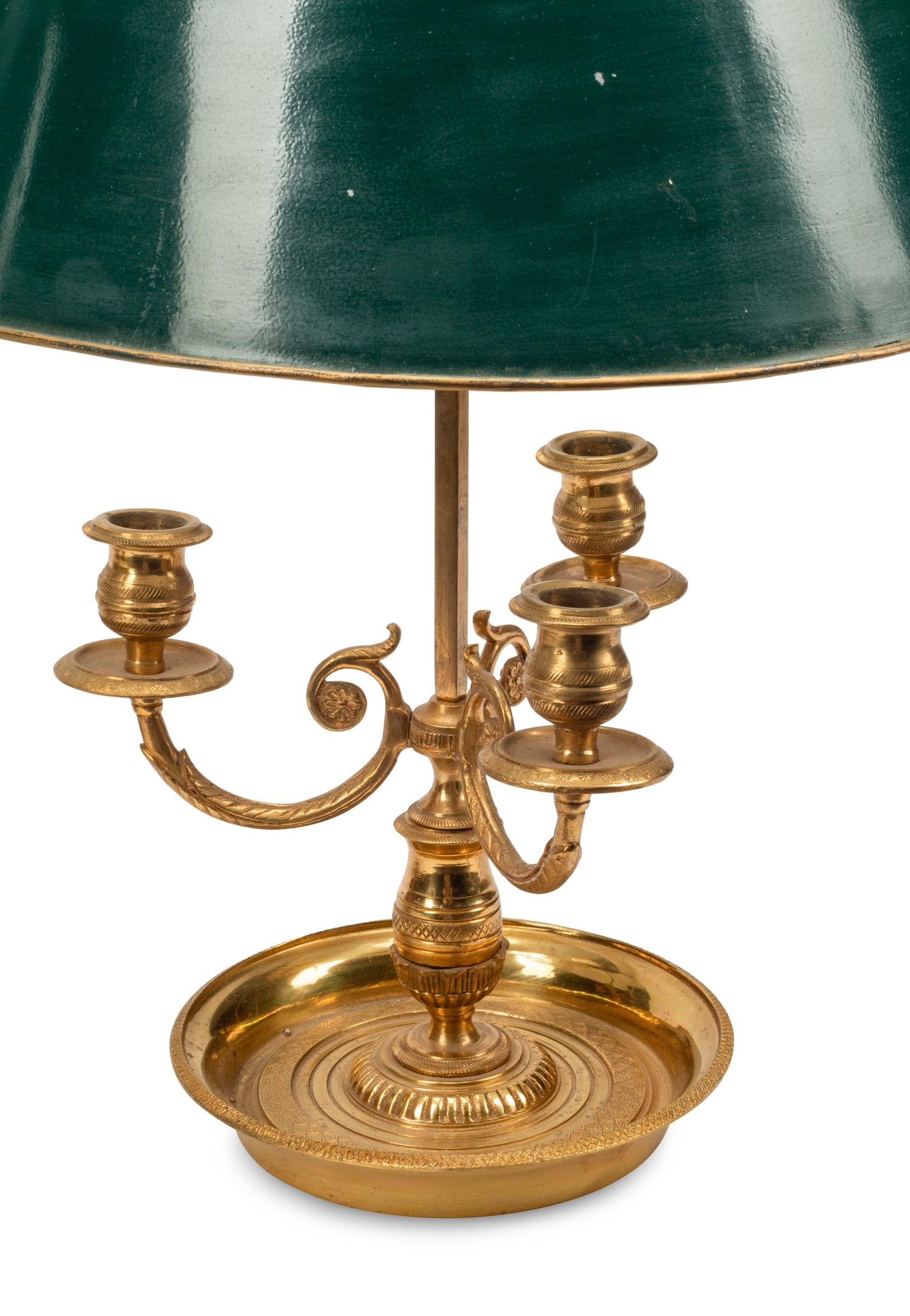 A Pair of Brass Bouillotte Lamps with Tole Shades