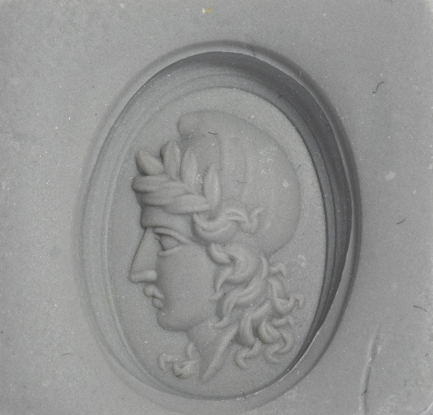 A Neoclassical Gold and Bloodstone Finger Ring with a Female Portrait Head Wearing a Phrygian Cap (Symbol of Liberty)