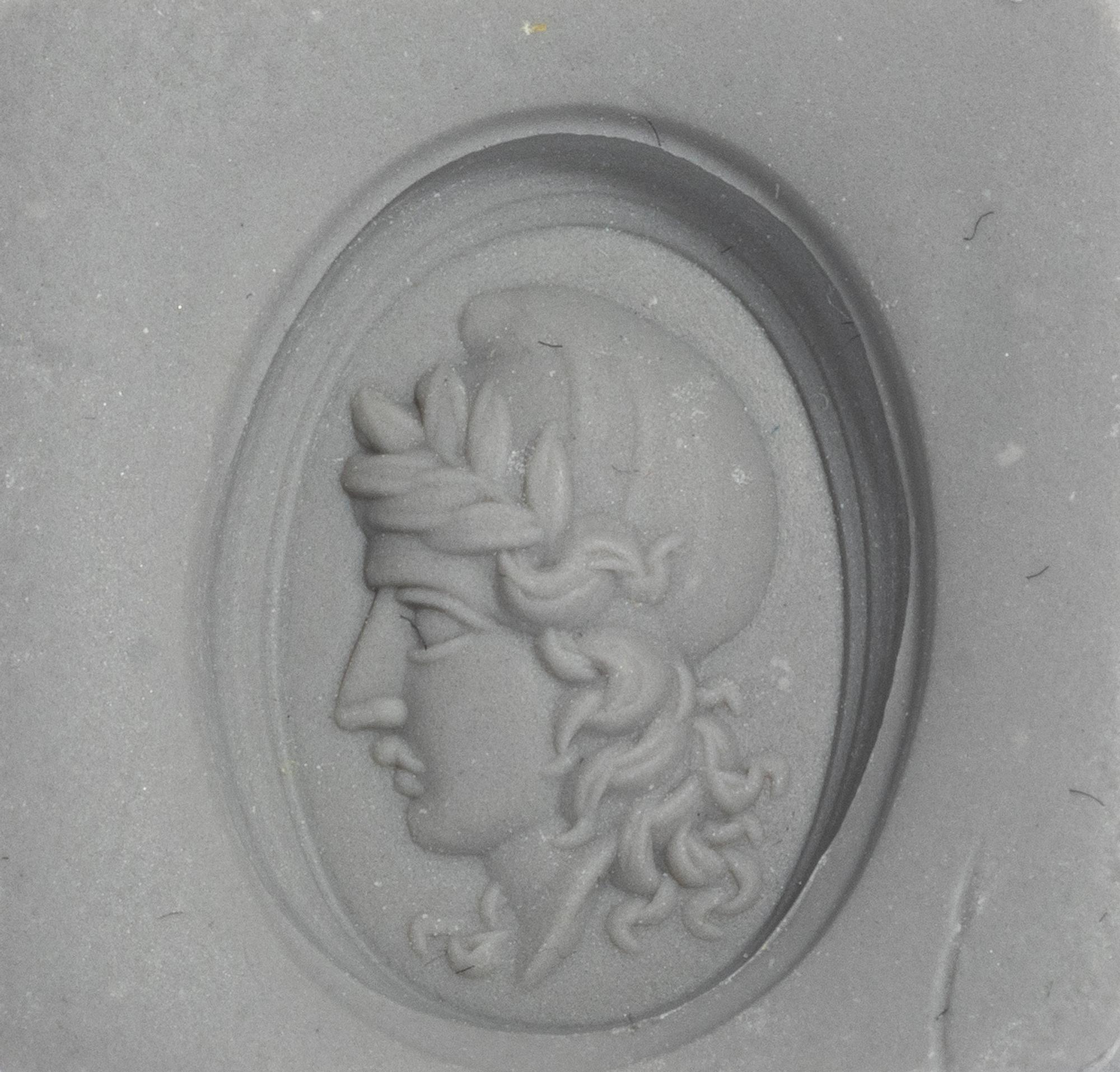 A Neoclassical Gold and Bloodstone Finger Ring with a Female Portrait Head Wearing a Phrygian Cap (Symbol of Liberty)