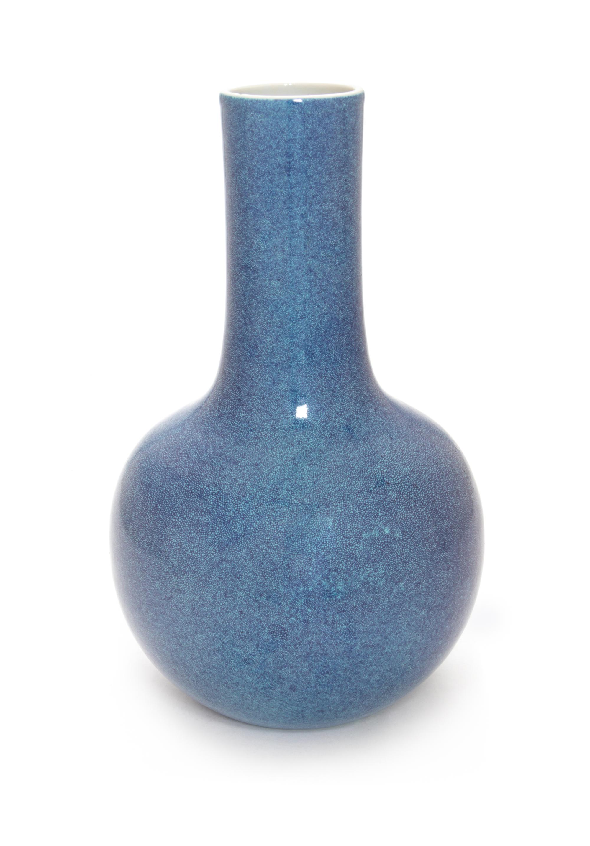 A Robin's Egg Glazed Porcelain Bottle Vase Height 8 1/4 inches. — QING DYNASTY (1644-1912)