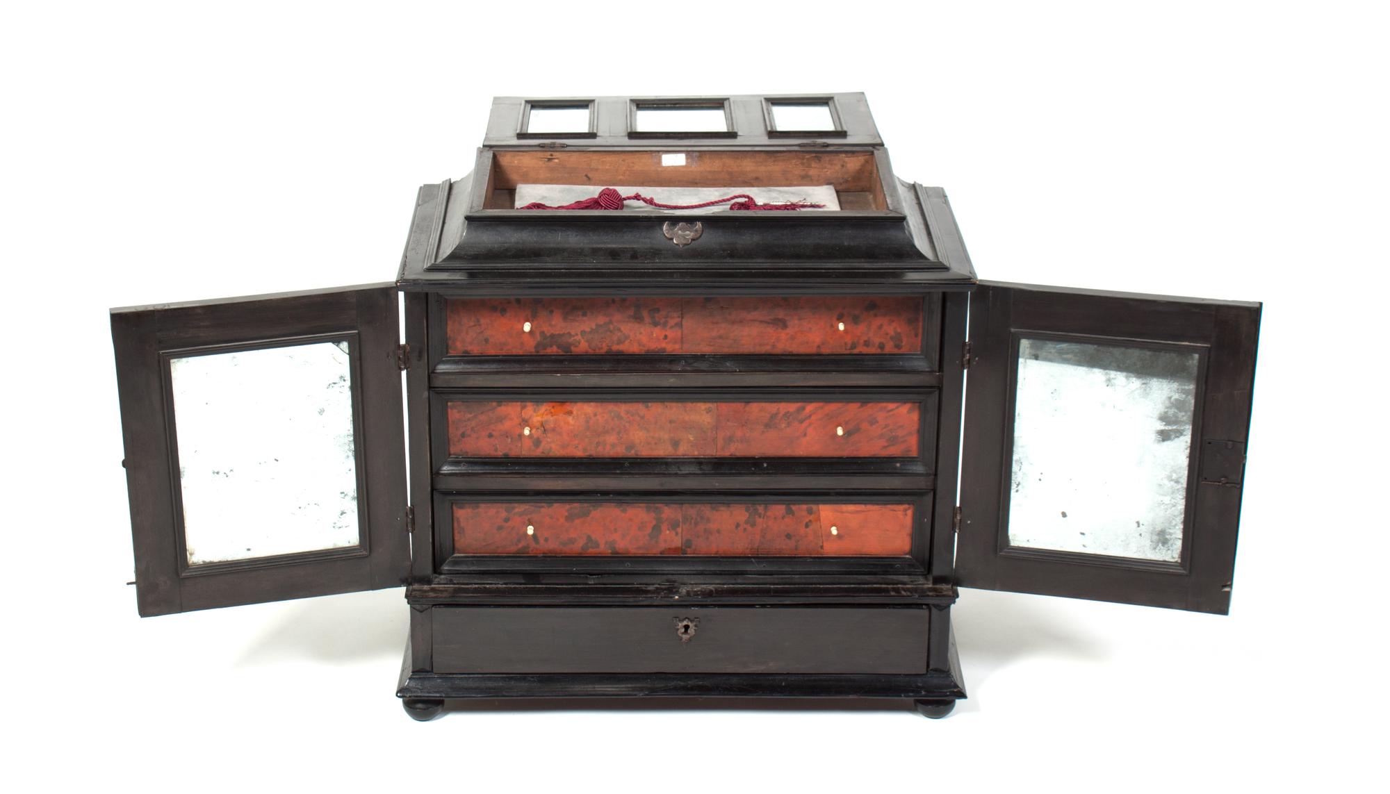An Italian Ebony and Tortoise Shell Collector's Cabinet Height 23 1/2 x width 24 x depth 12 inches.