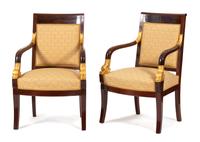 A Pair of French Empire Style Mahogany and Parcel Gilt Armchairs