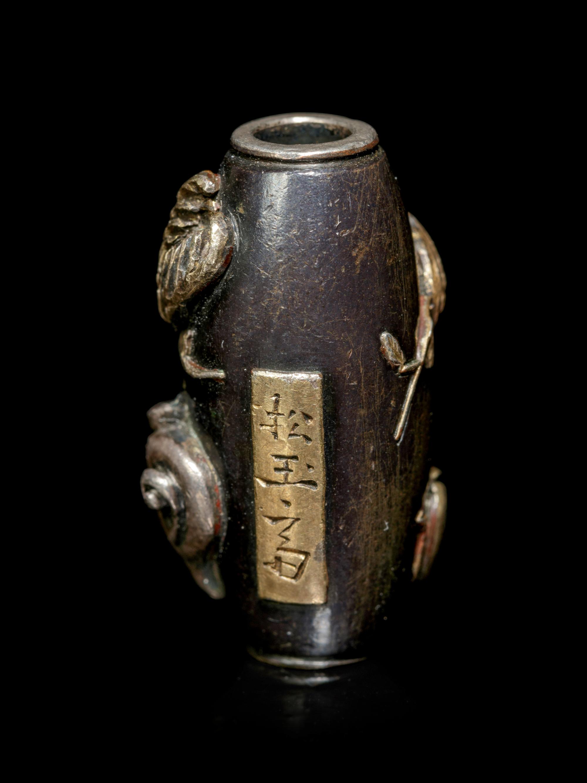 A Silver and Bronze Bead-Form Ojime