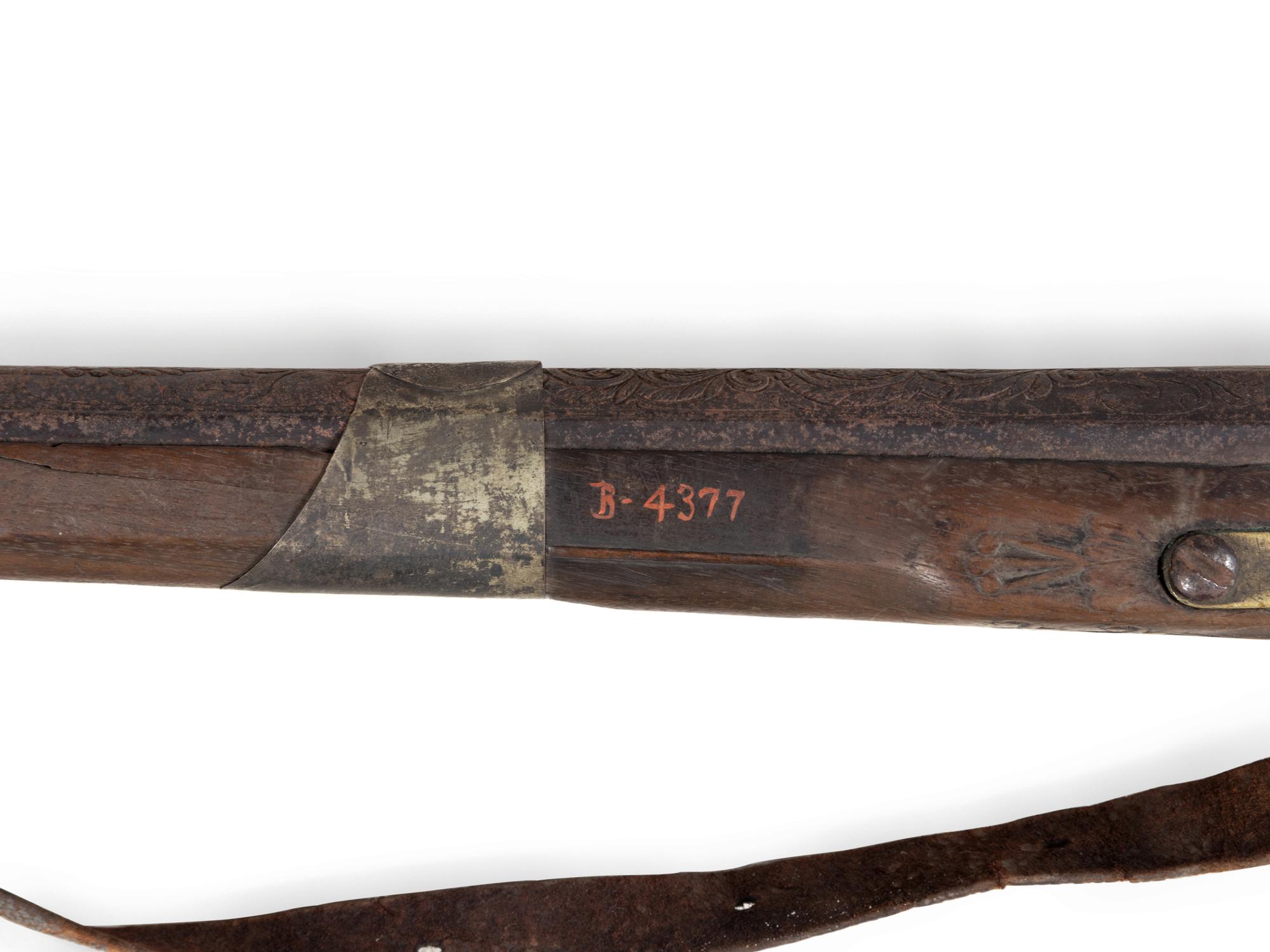 An Egyptian or Near Eastern Metal Inlaid Flintlock Rifle