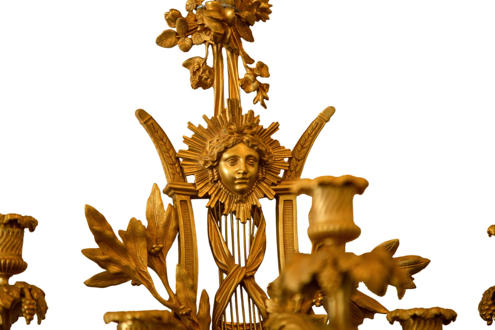 A Set of Four Louis XVI Style Gilt Bronze Five-Light Sconces