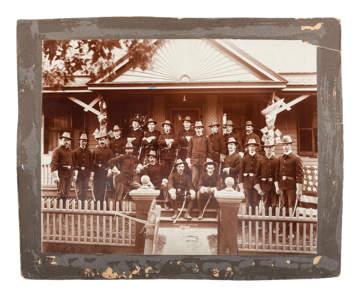 [SPANISH-AMERICAN WAR]. WALKER, W.G., photographer. Photograph of members of the Wyoming (Alger) Light Artillery. Cheyenne, WY.