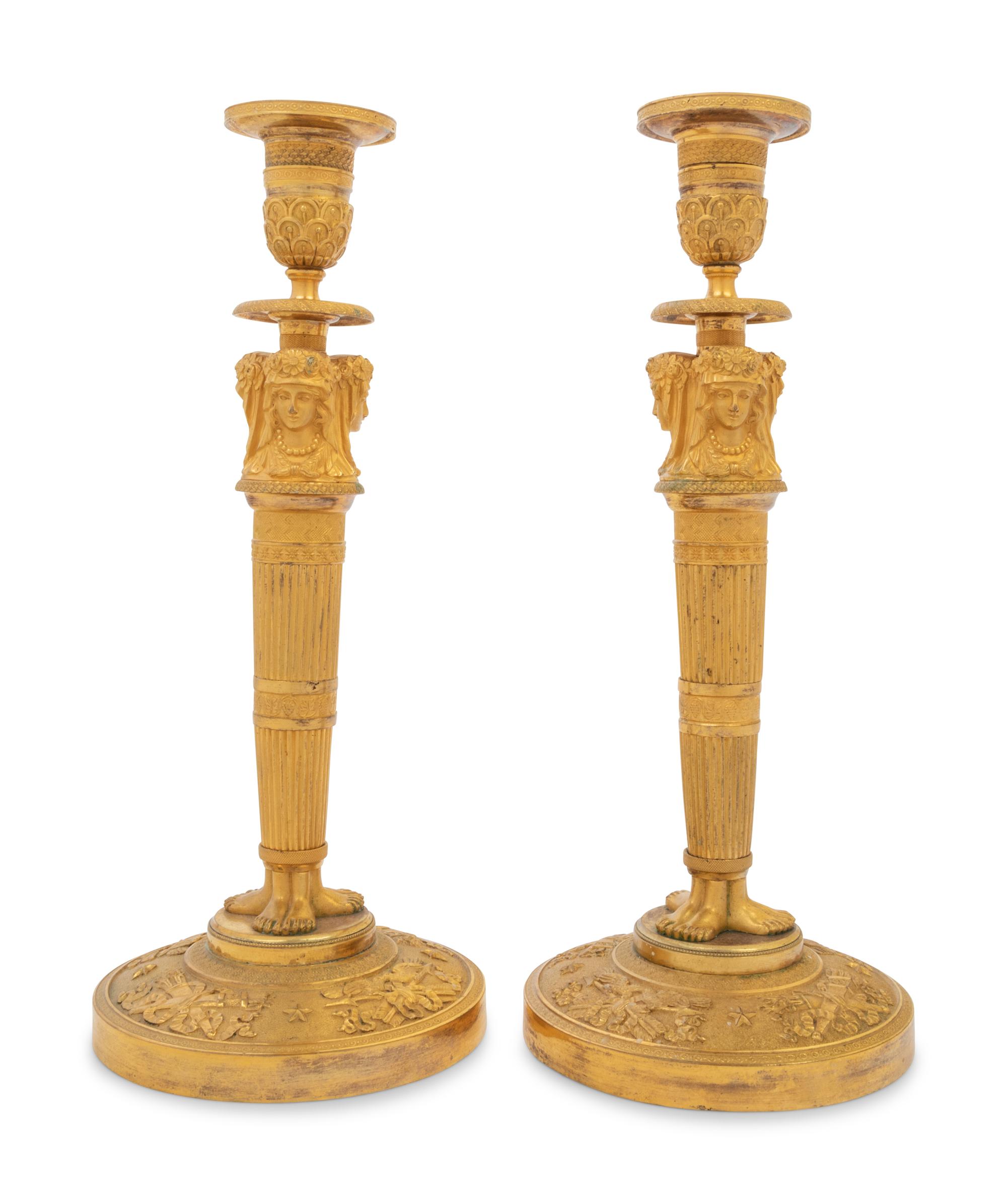 A Pair of Empire Gilt Bronze Candlesticks