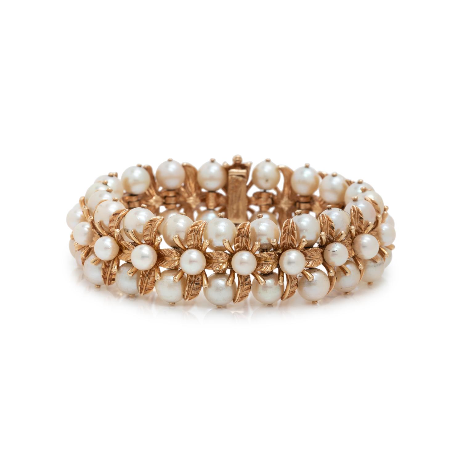 CARL D. LINDSTROM, YELLOW GOLD AND CULTURED PEARL BRACELET
