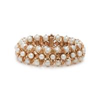 CARL D. LINDSTROM, YELLOW GOLD AND CULTURED PEARL BRACELET