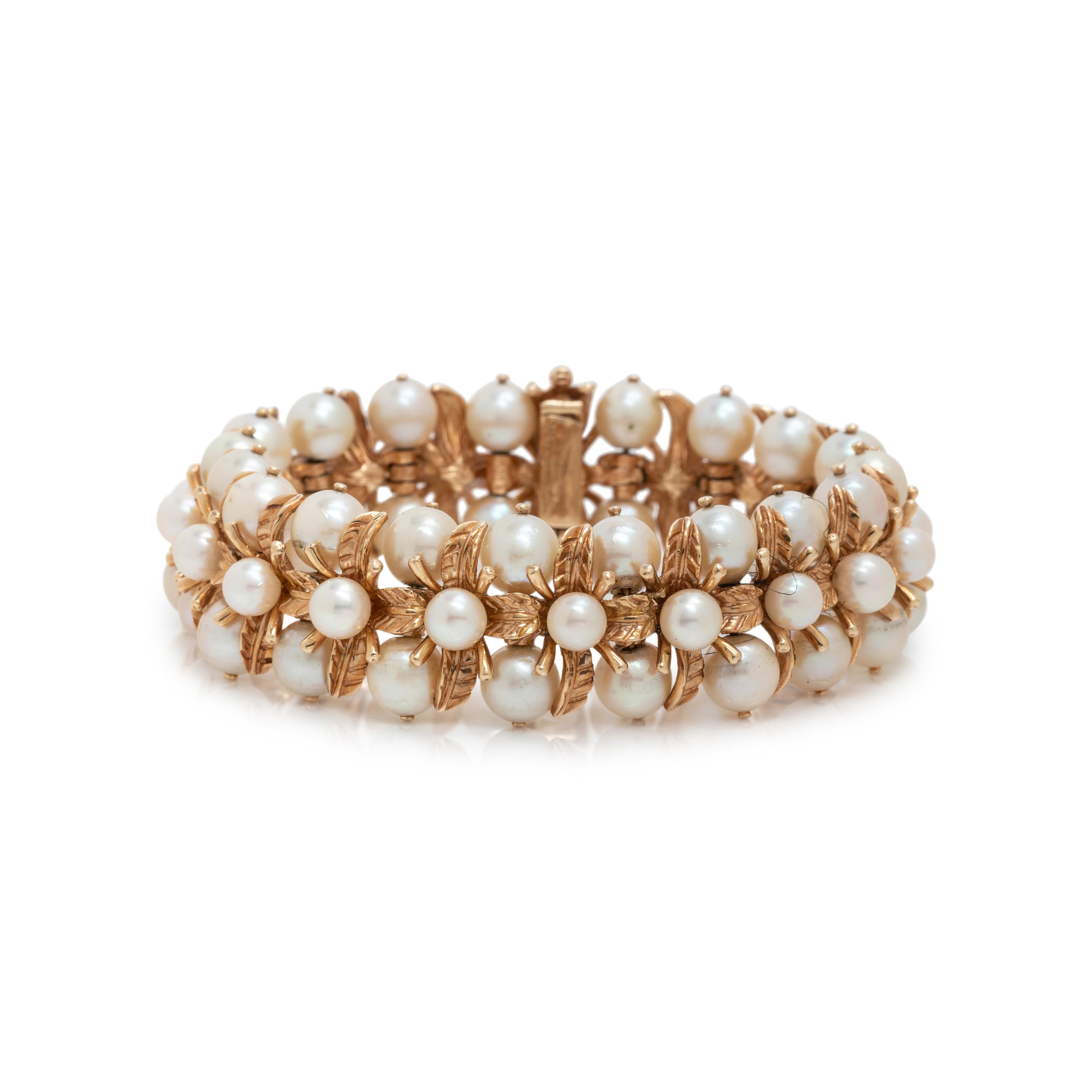 CARL D. LINDSTROM, YELLOW GOLD AND CULTURED PEARL BRACELET