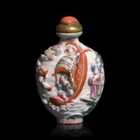A Chinese Enameled Molded Porcelain " Baxian" Snuff Bottle, Jiaqing Mark