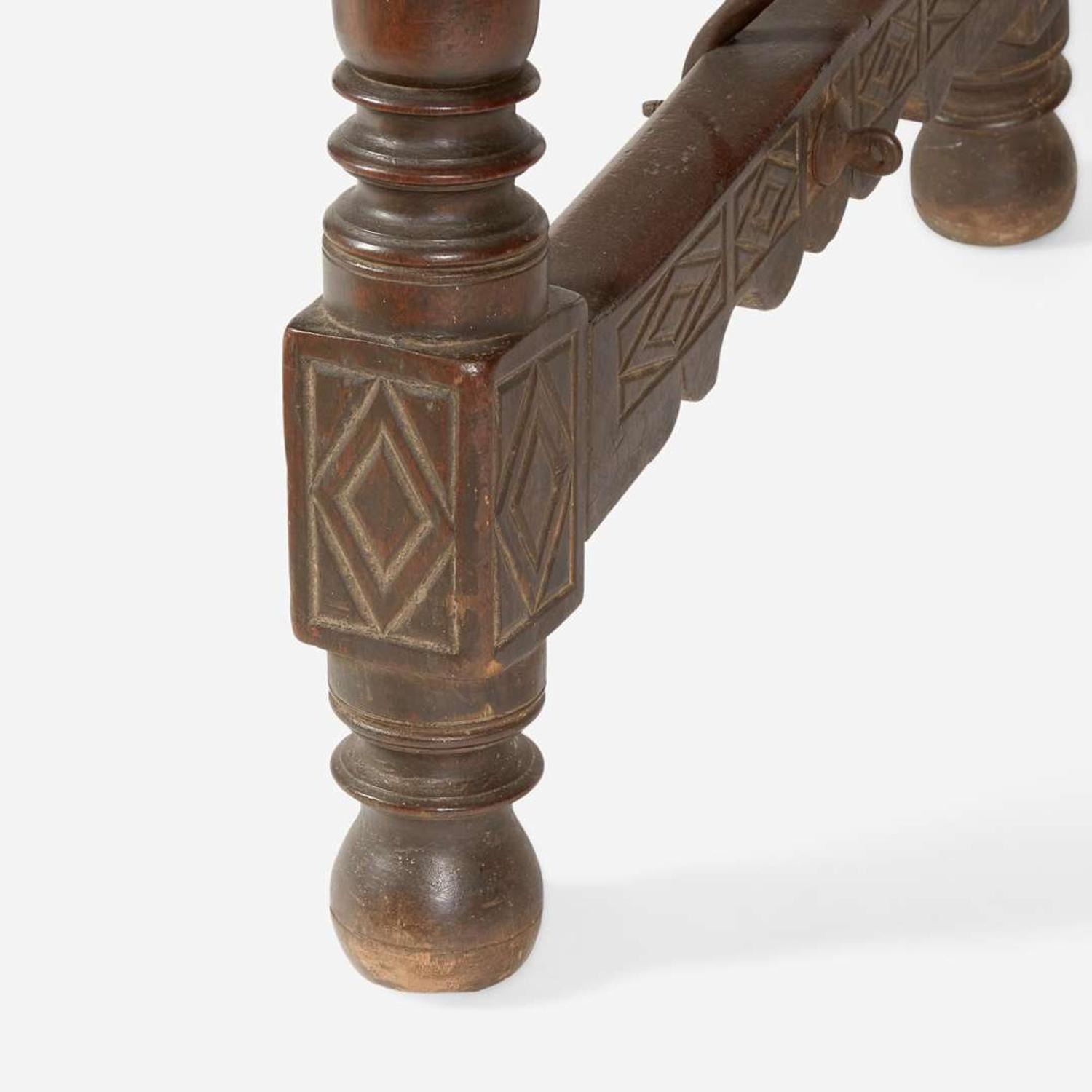 A Spanish Baroque carved walnut and iron stretcher table Probably 17th century