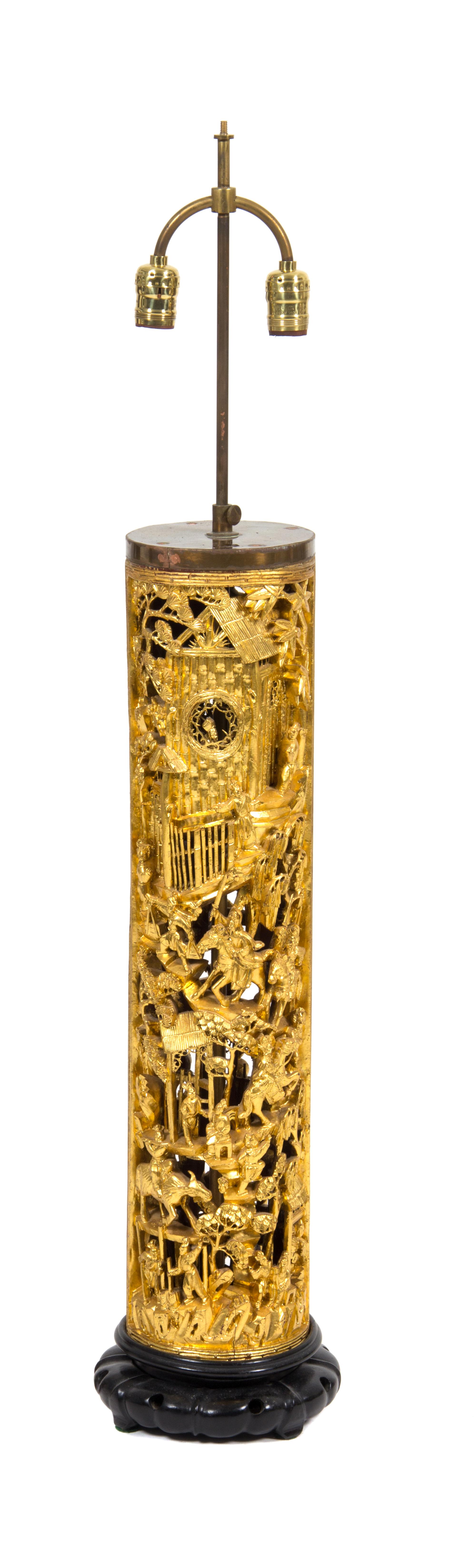 A Chinese Pierce Carved Giltwood Table Lamp Height of lamp 42 inches.