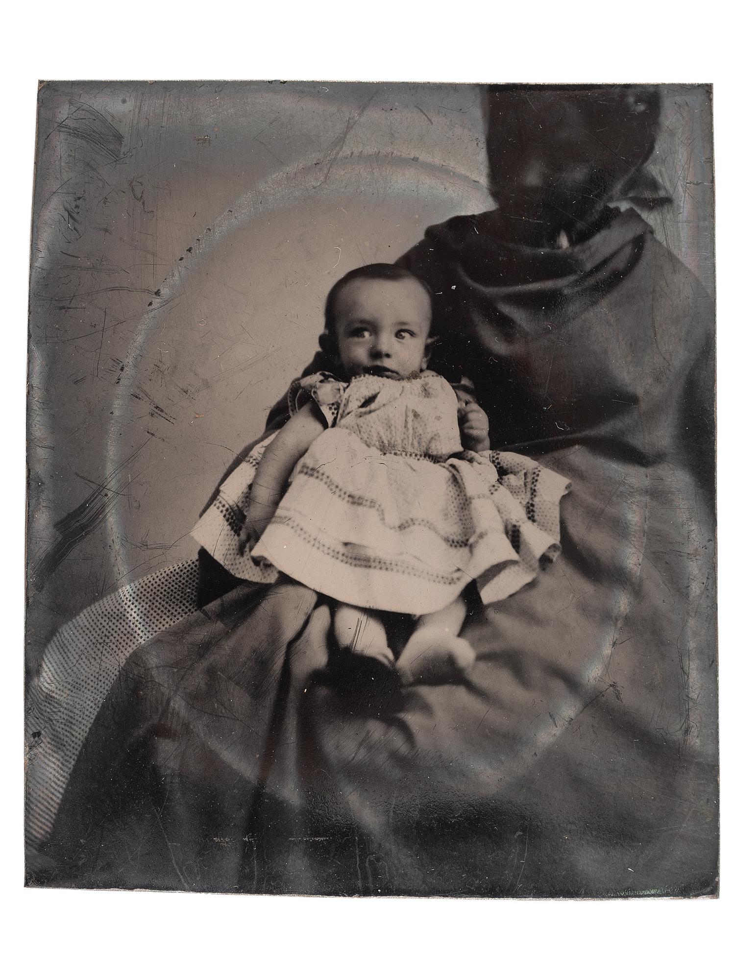[EARLY PHOTOGRAPHY]. Sixth plate and sixteenth plate tintypes of African American women holding white children, comprising:
