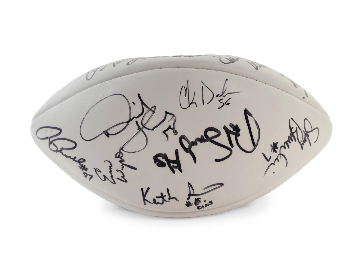A Group of Three Signed Football Items Including Derrick Thomas and Lawrence Taylor