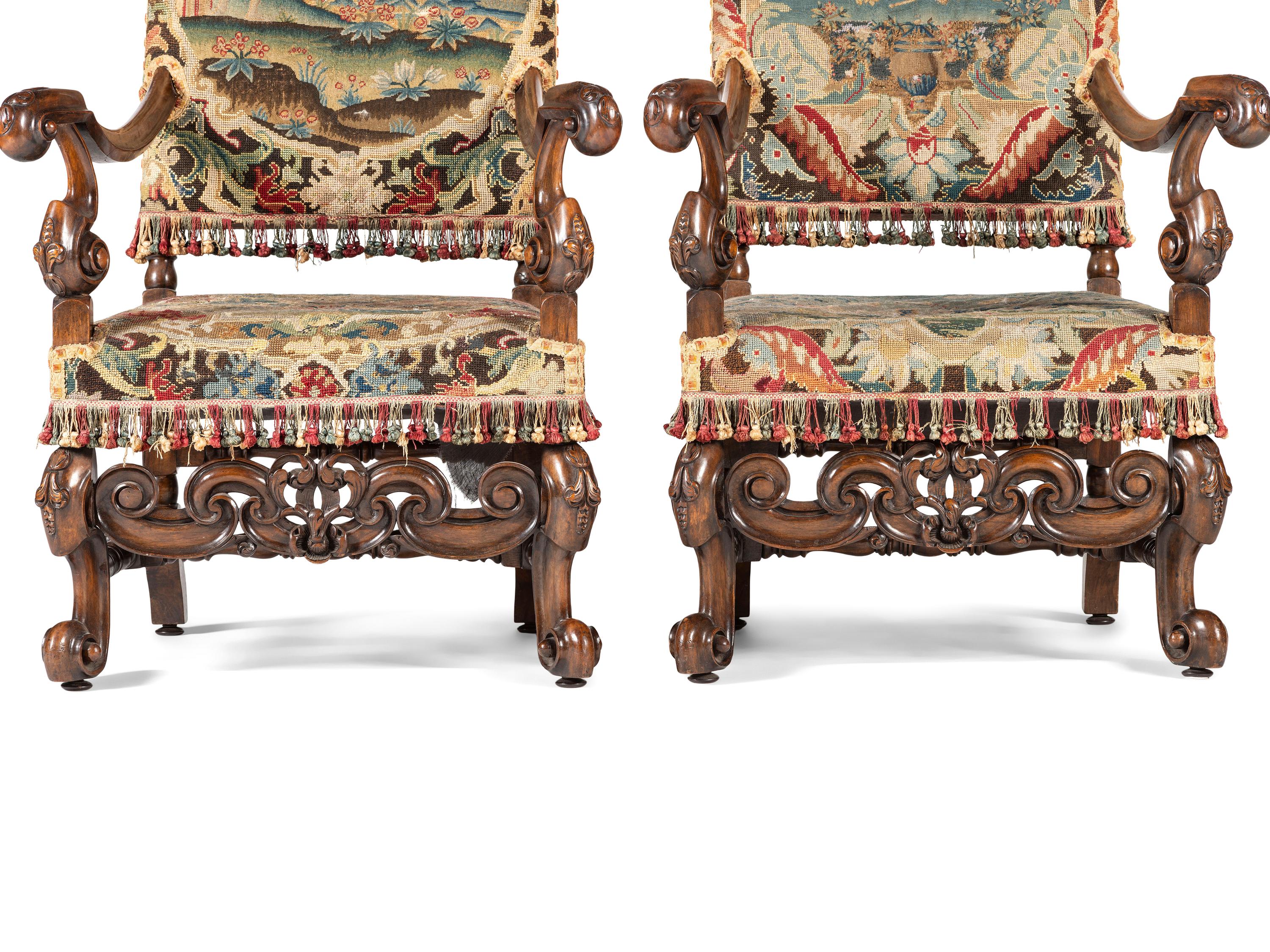 A Pair of William and Mary Style Walnut Armchairs with Flemish Tapestry Upholstery