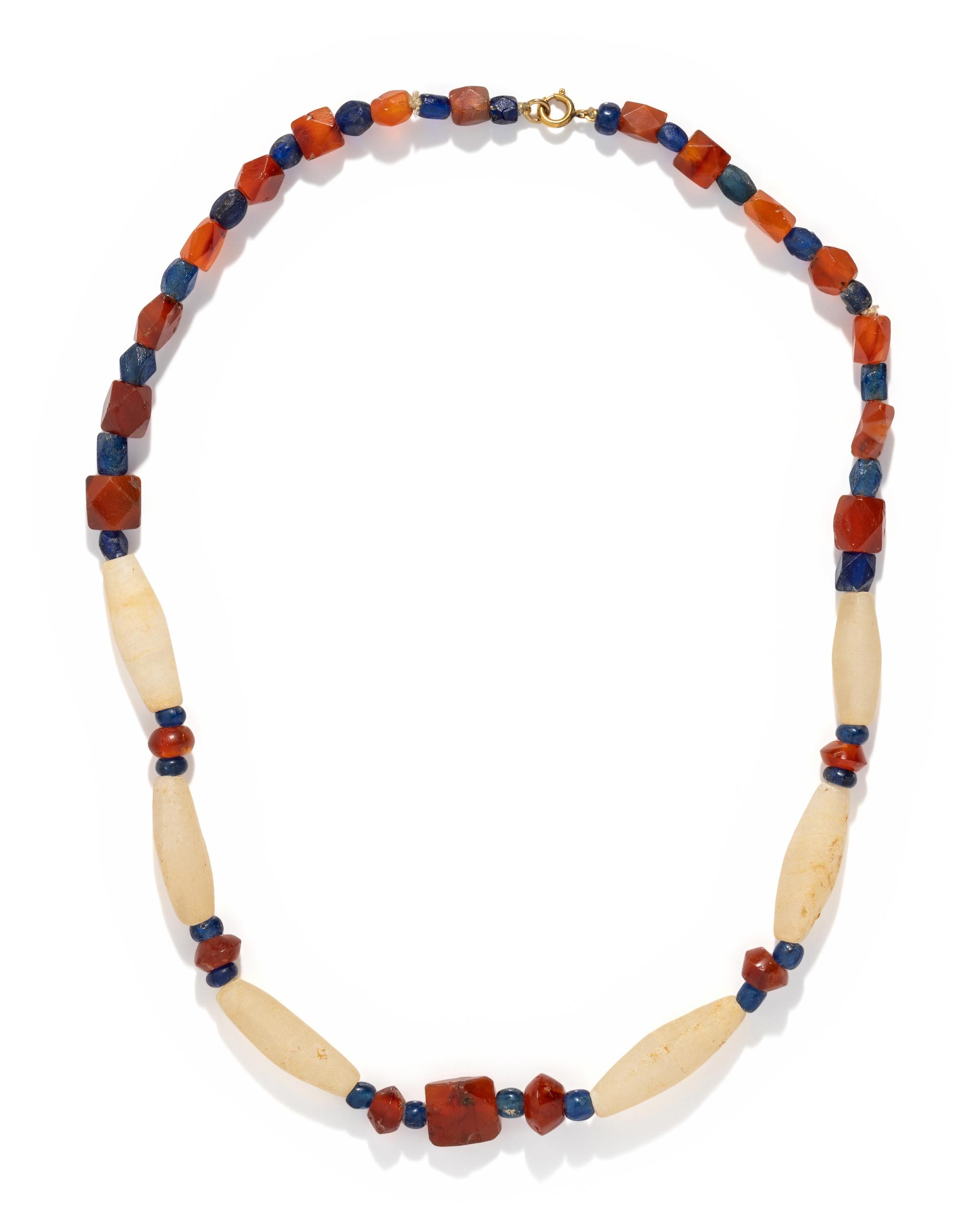 A Near Eastern Carnelian and Quartz Bead Necklace