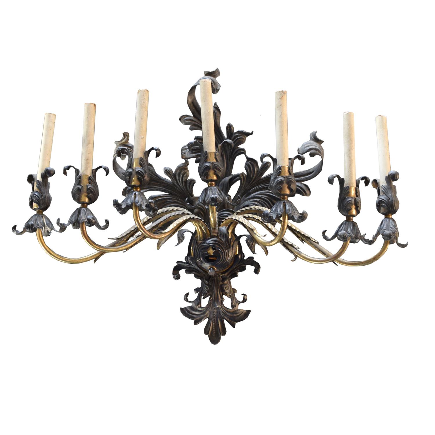 A Brass and Iron Seven Arm Wall Sconce, United States, Circa 1930,