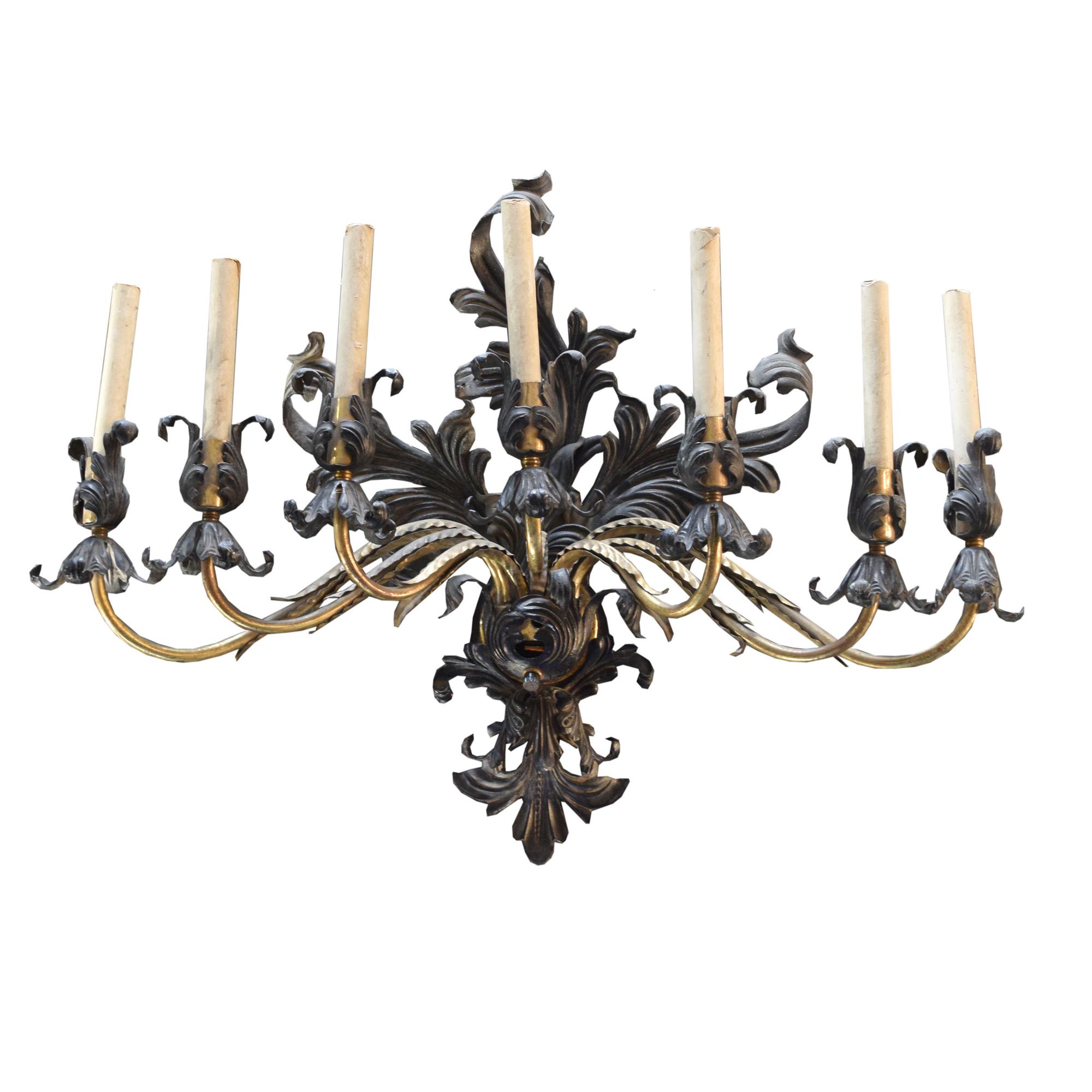 A Brass and Iron Seven Arm Wall Sconce, United States, Circa 1930,