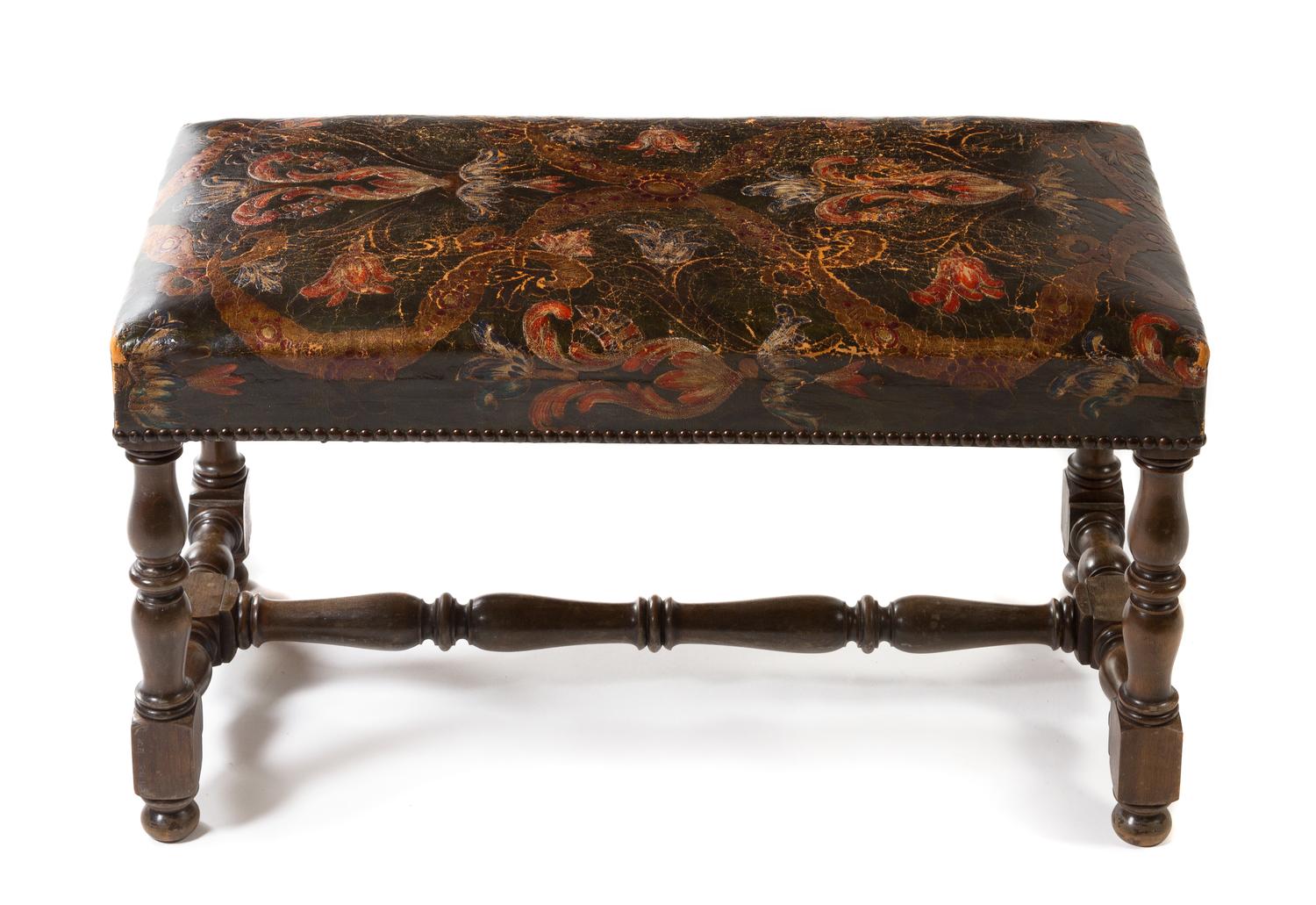 A William and Mary Style Leather Upholstered Bench Width 30 inches.