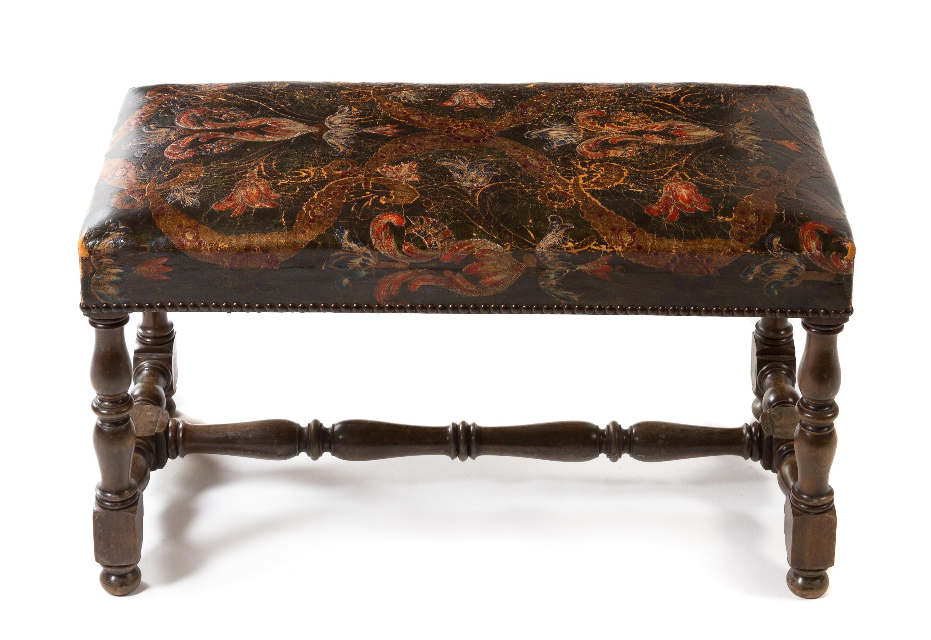 A William and Mary Style Leather Upholstered Bench Width 30 inches.